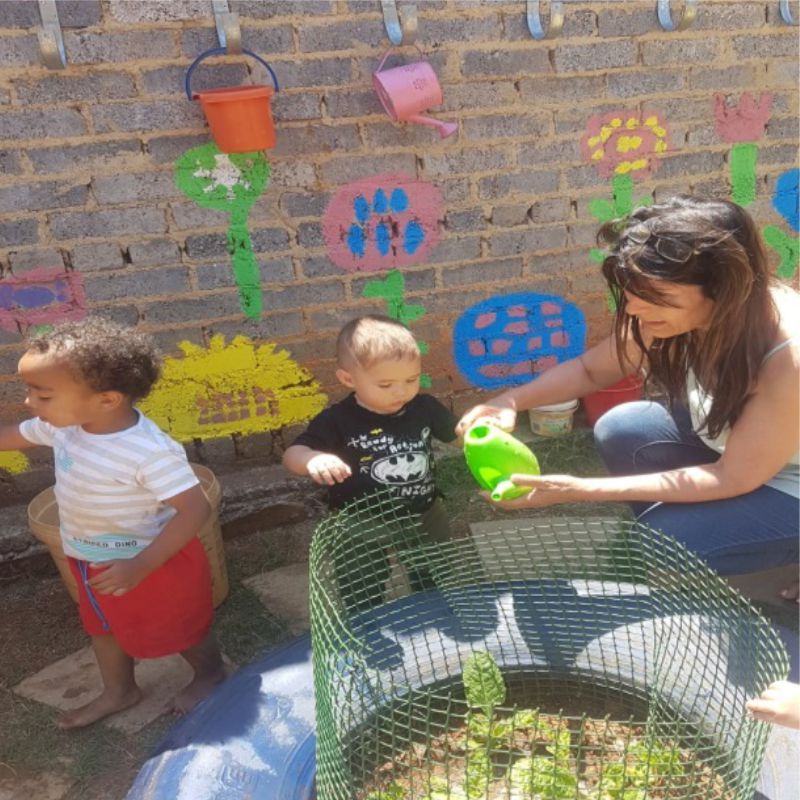 Gardening by the flower wall